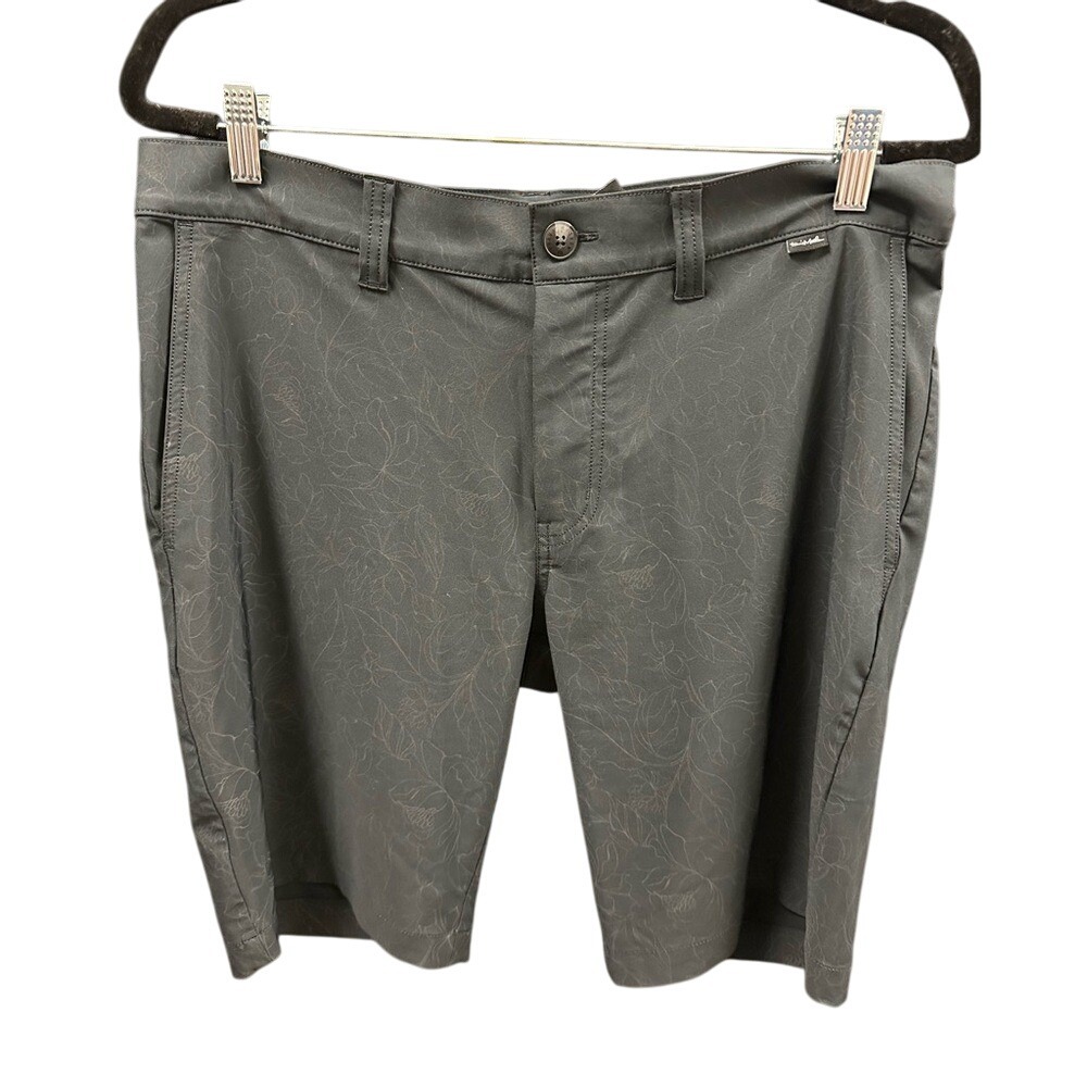 Travis Matthew black flower design golf shorts